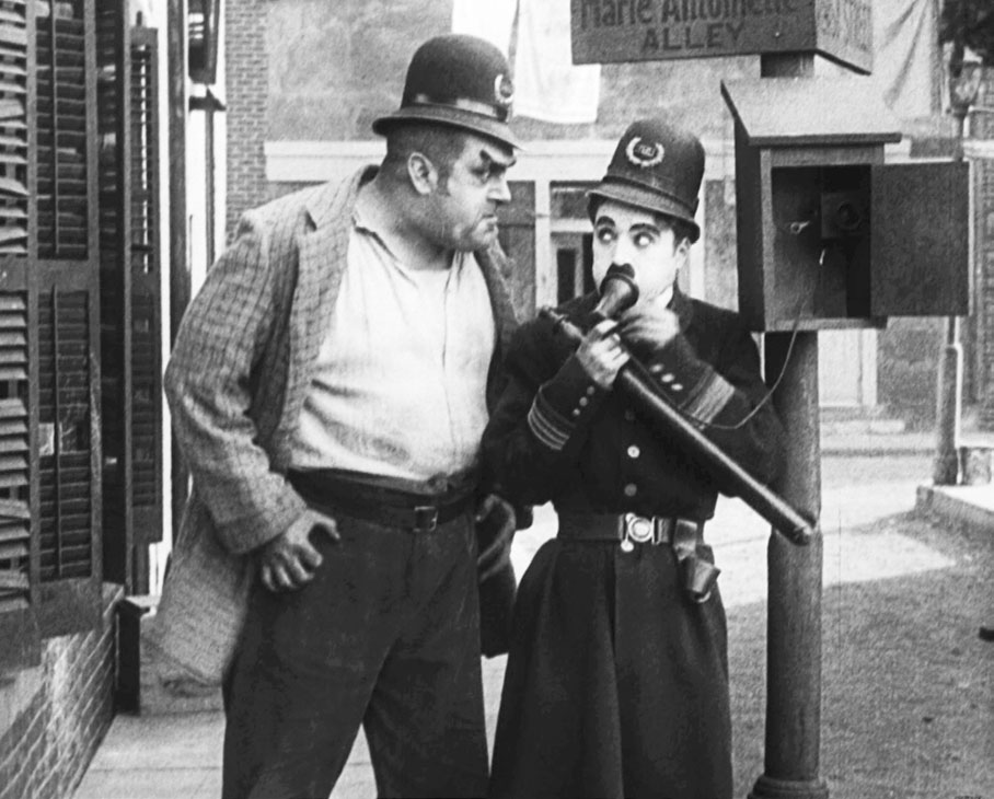 Charlie Chaplin dans Charlot policeman
