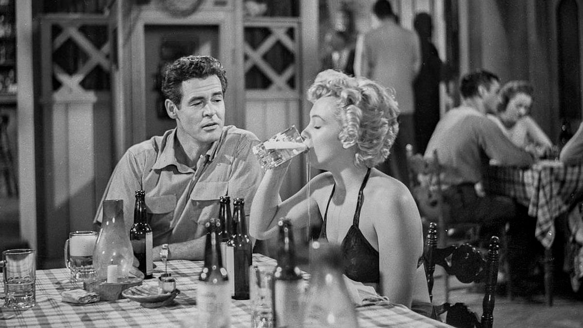 Marilyn Monroe, Robert Ryan dans Le démon s'éveille la nuit