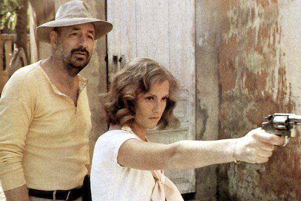 Isabelle Huppert, Philippe Noiret dans Coup de torchon