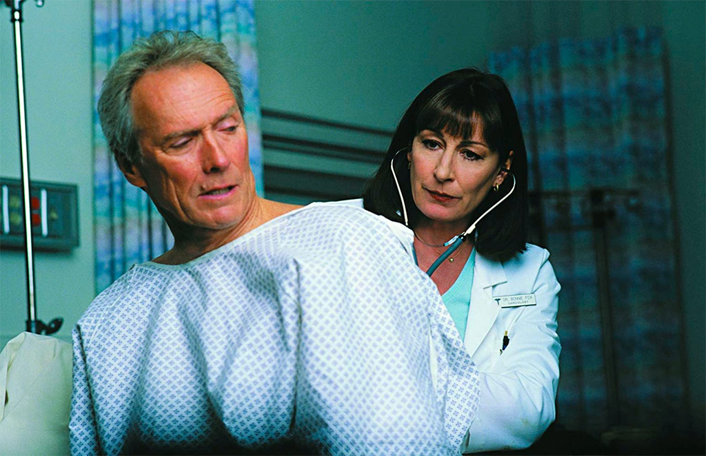 Clint Eastwood, Anjelica Huston dans Créance de sang