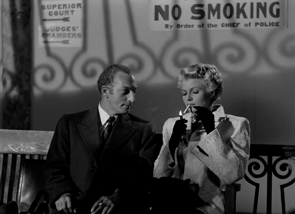Everett Sloane, Rita Hayworth dans La dame de Shanghai