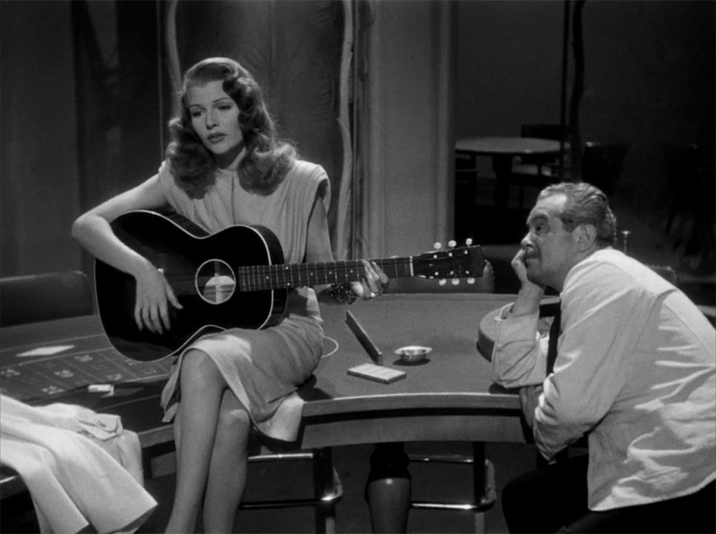 Rita Hayworth, Steven Geray dans Gilda