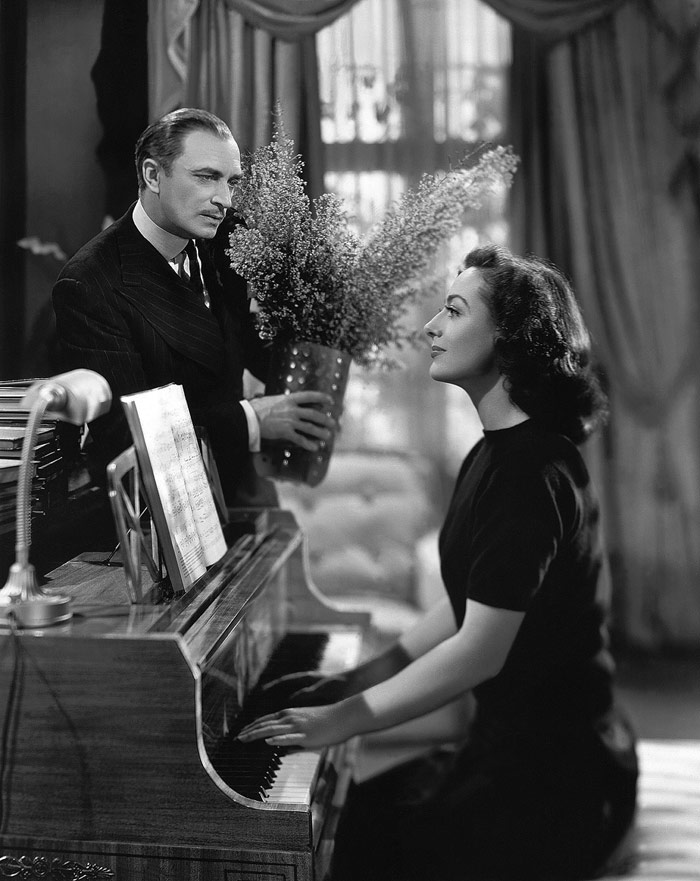  Joan Crawford, Conrad Veidt, Melvyn Douglas dans Il était une fois