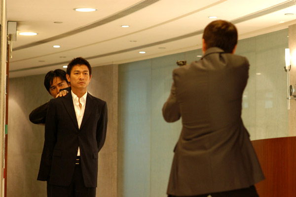 Andy Lau, Tony Leung Chiu-wai dans Infernal Affairs