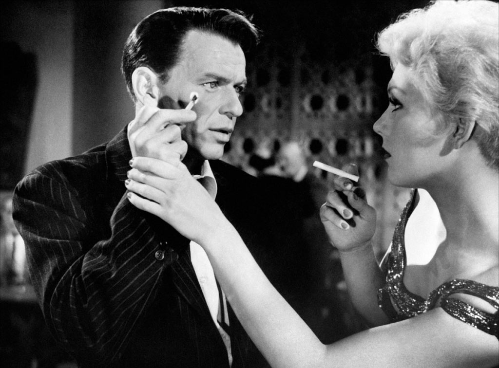 Frank Sinatra, Kim Novak dans L'Homme au bras d'or