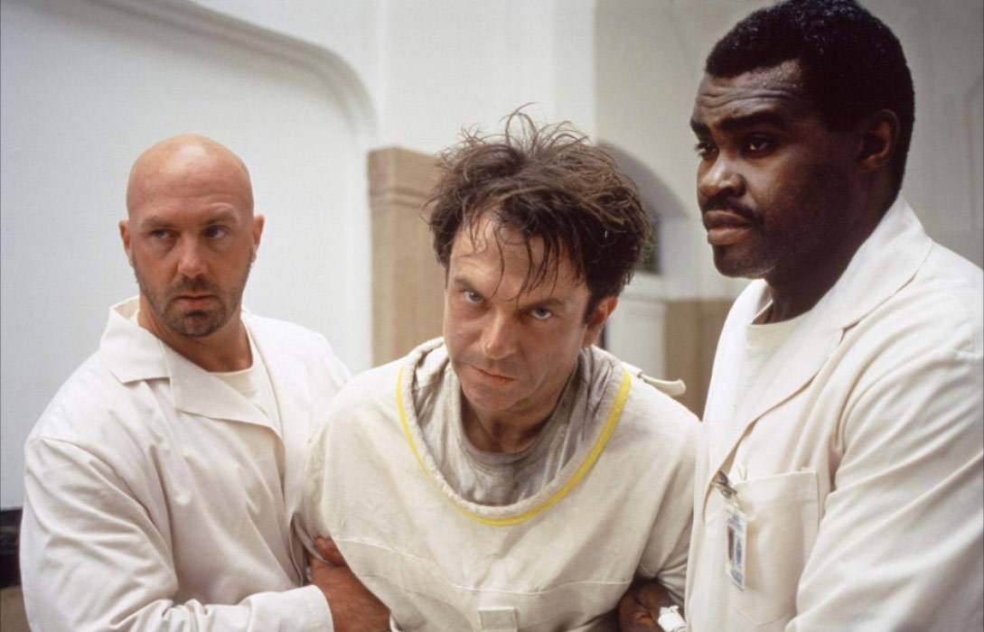 Sam Neill dans L'Antre de la folie
