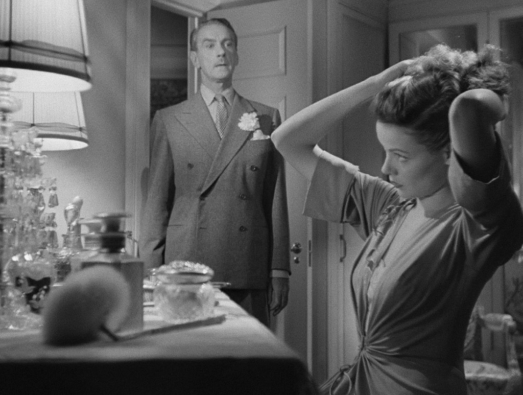 Gene Tierney, Clifton Webb dans Laura