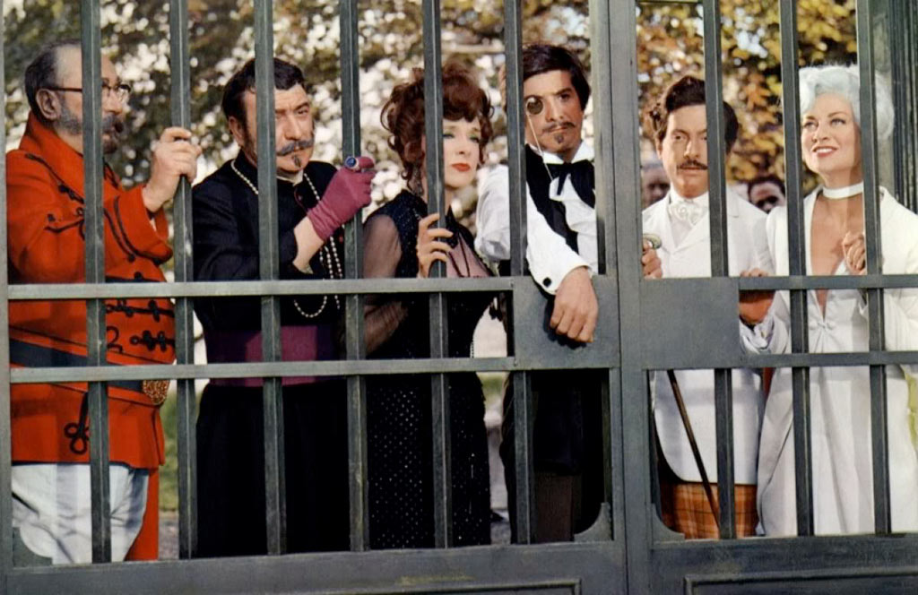 Julien Guiomar, Micheline Presle, Jean-Claude Brialy, Michel Serrault, Francoise Christophe dans Le Roi de cœur
