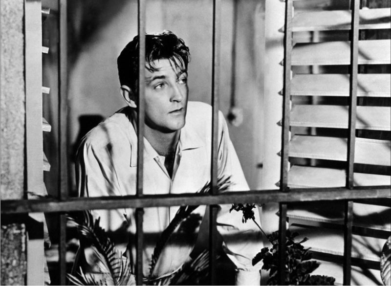 Robert Mitchum dans Le Paradis des mauvais garçons (Macao)