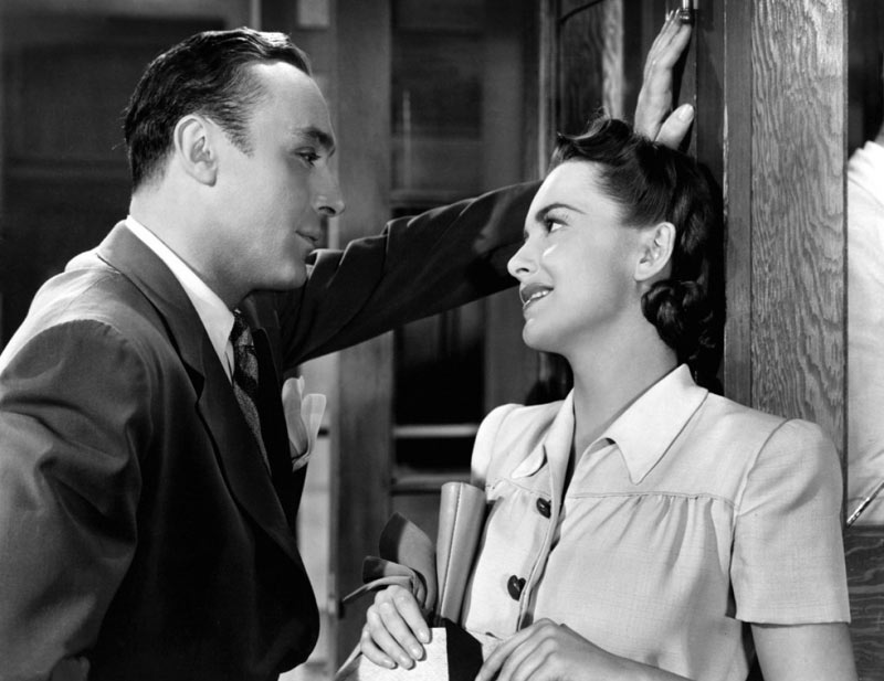 Charles Boyer, Olivia de Havilland dans Par la Porte d'or (Hold back the dawn)