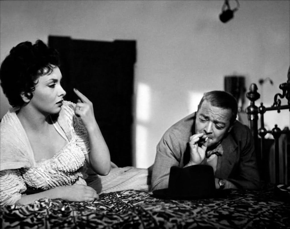 Gina Lollobrigida, Peter Lorre dans Plus fort que le diable