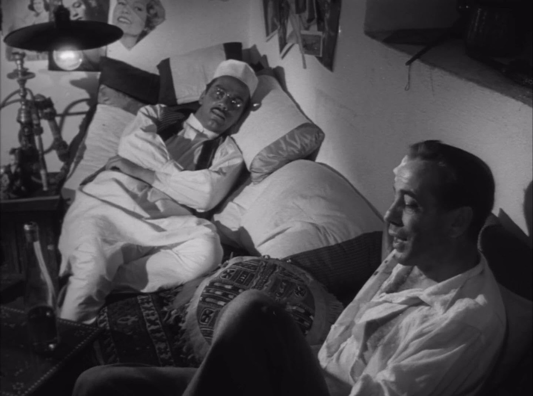 Humphrey Bogart, Manuel Serrano dans Plus fort que le diable