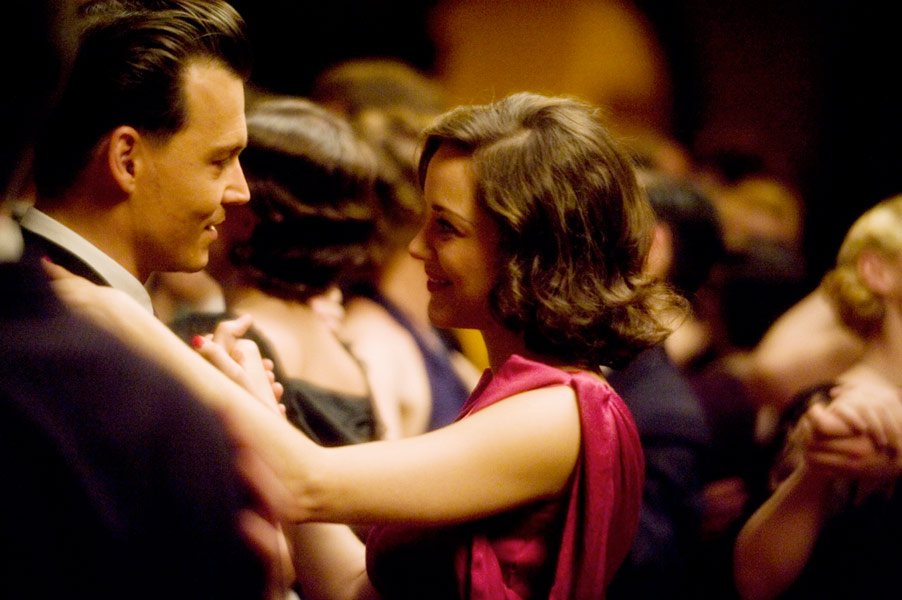 Johnny Depp, Marion Cotillard dans Public Enemies