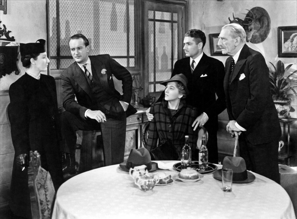 Joan Fontaine, Judith Anderson, George Sanders, Laurence Olivier dans Rebecca