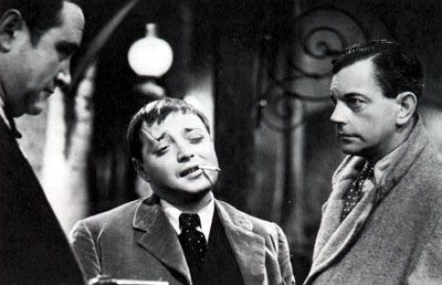 Peter Lorre, Leslie Banks dans L'homme qui en savait trop