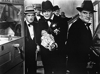 Vince Barnett, Paul Muni, Tony Camonte dans Scarface