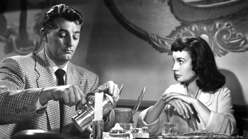 Robert Mitchum, Jean Simmons dans Un si doux visage