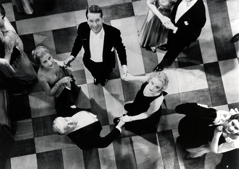 Genevieve Tobin, Jeanette McDonald, Maurice Chevalier dans Une Heure près de toi