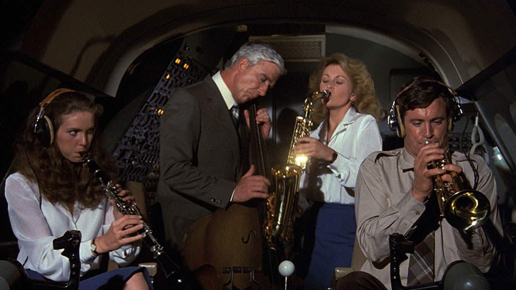 Leslie Nielsen, Robert Hays, Julie Hagerty, Lorna Patterson dans Y a-t-il un pilote dans l'avion ?